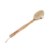 This long-handled bath brush features a removable brush head with a built-in hook design.